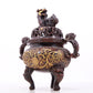 An exquisite gilt bronze censer with double ears and three legs with lotus and auspicious animal patterns.