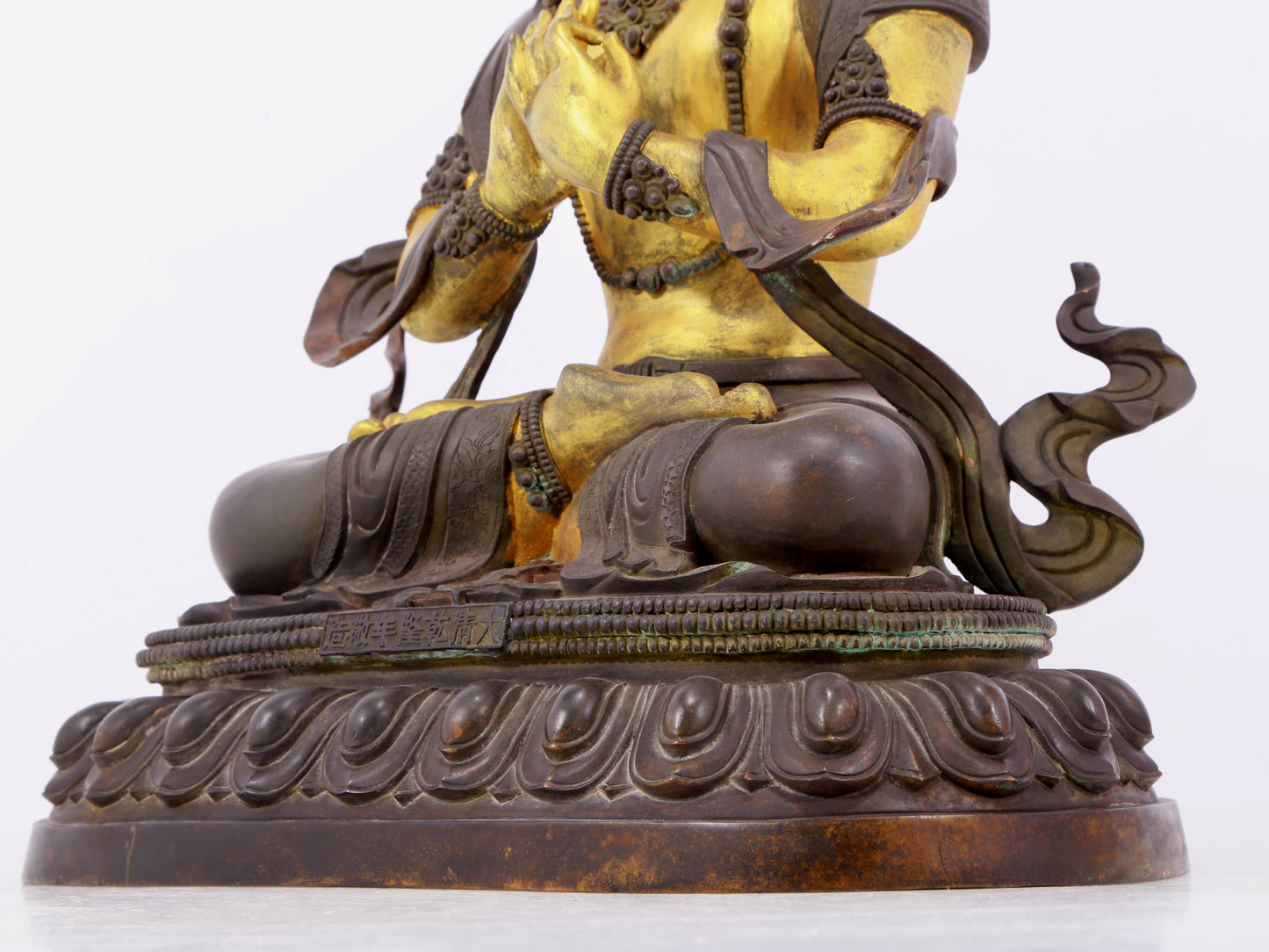 A solemn gilt bronze statue of Bodhisattva