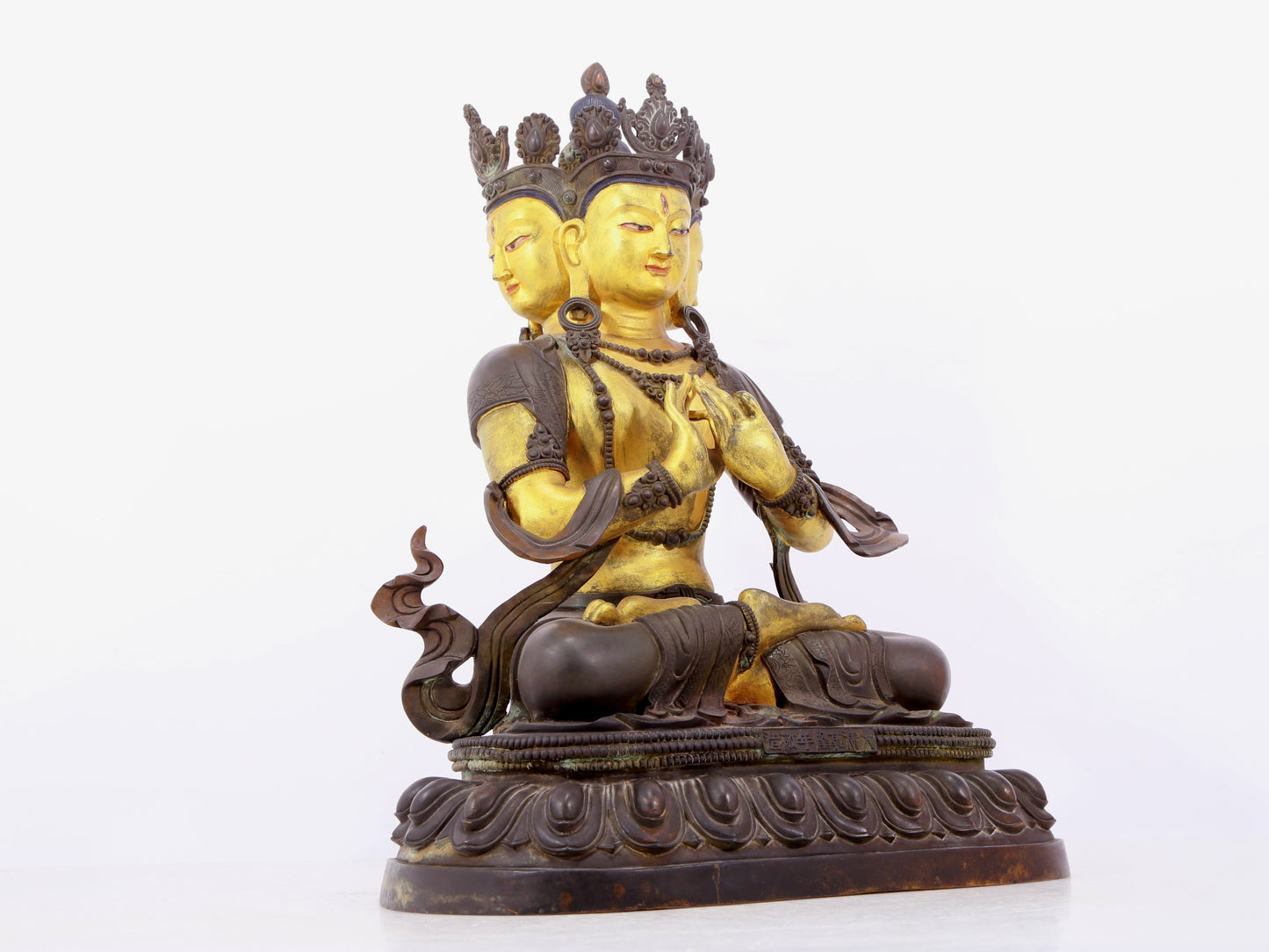 A solemn gilt bronze statue of Bodhisattva