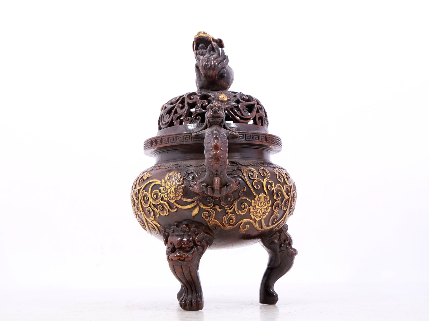 An exquisite gilt bronze censer with double ears and three legs with lotus and auspicious animal patterns.