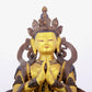 A solemn gilt bronze statue of green Tara