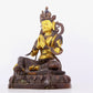 A solemn gilt bronze statue of green Tara