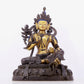 A solemn gilt bronze statue of green Tara