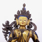 A solemn gilt bronze statue of green Tara