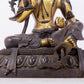 A solemn gilt bronze statue of green Tara