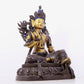 A solemn gilt bronze statue of green Tara