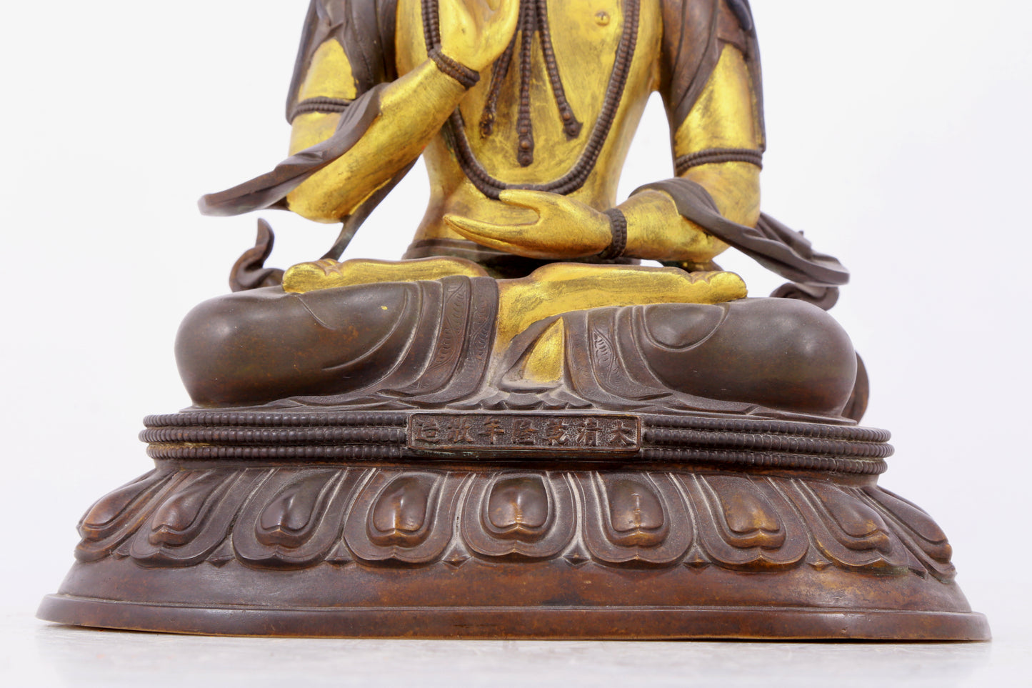 A solemn gilt bronze statue of Bodhisattva