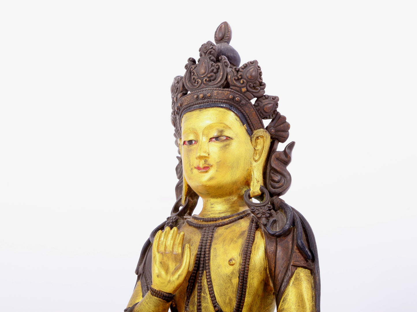 A solemn gilt bronze statue of Bodhisattva