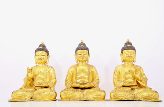 Three solemn gilt bronze statues of Sakyamuni