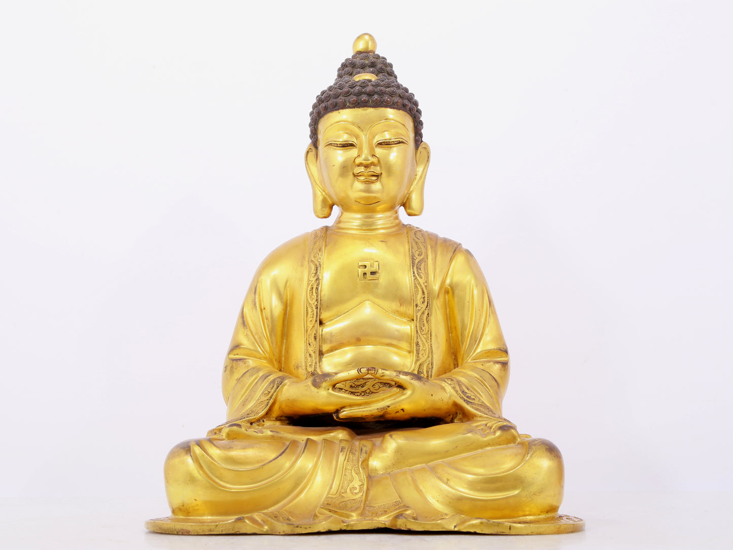 Three solemn gilt bronze statues of Sakyamuni