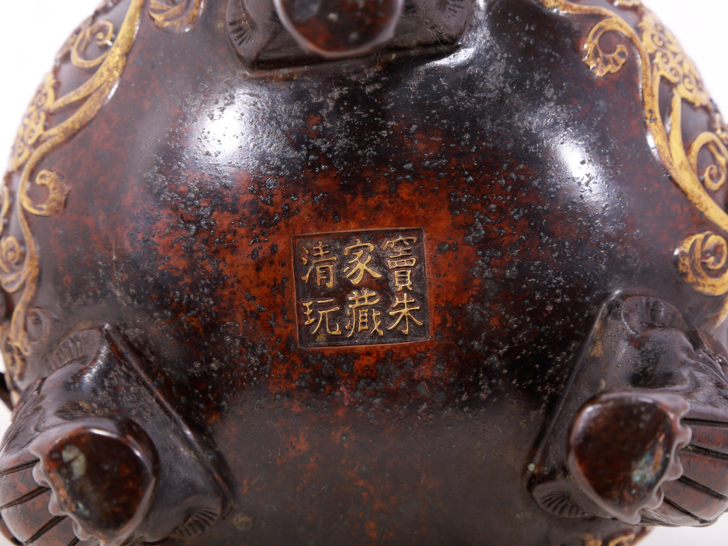 An exquisite gilt bronze censer with double ears and three legs with lotus and auspicious animal patterns.