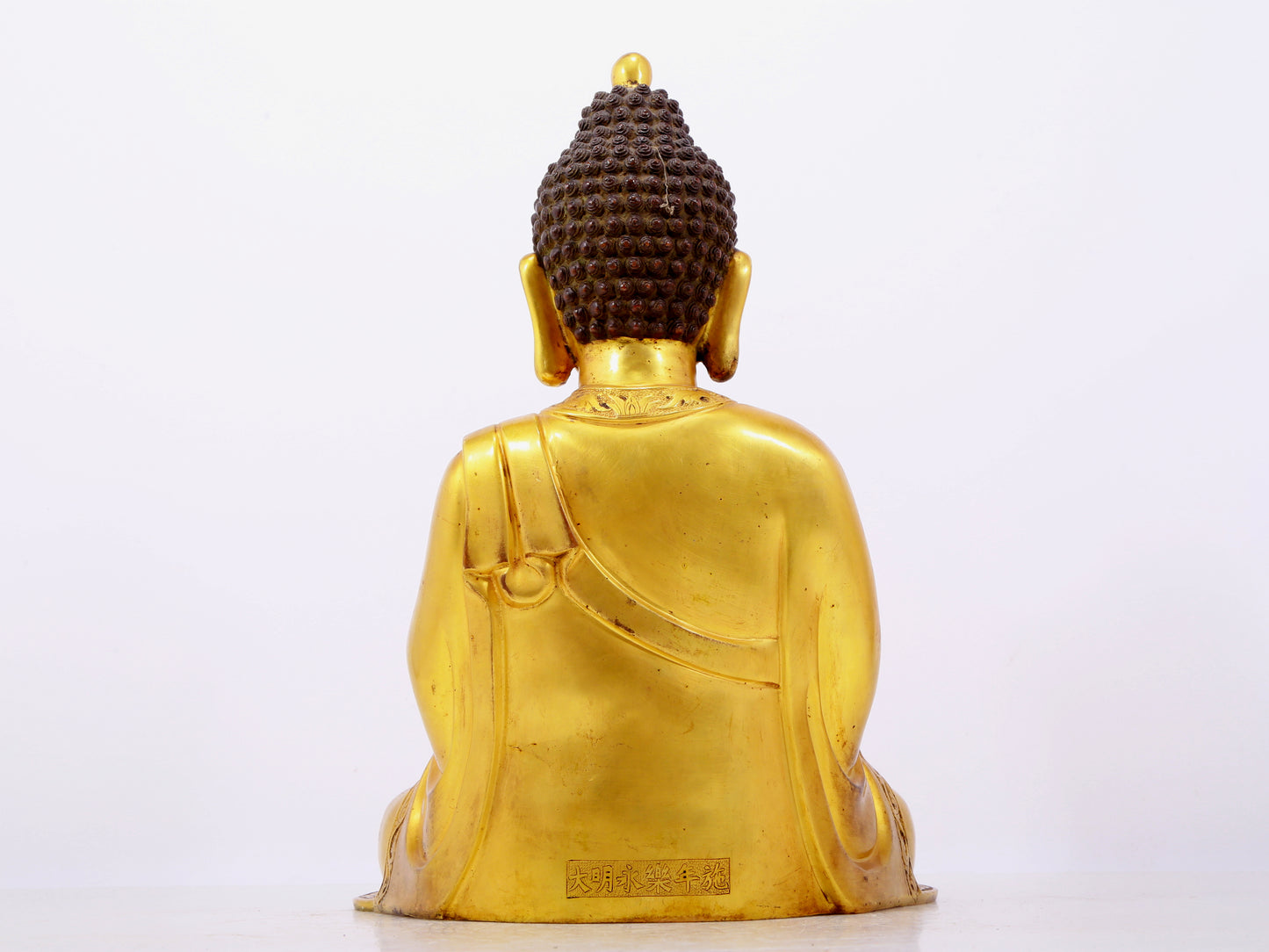 Three solemn gilt bronze statues of Sakyamuni