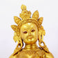 A solemn gilt bronze statue of green Tara