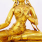 A solemn gilt bronze statue of green Tara