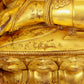 A solemn gilt bronze statue of green Tara