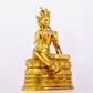 A solemn gilt bronze statue of green Tara