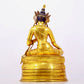 A solemn gilt bronze statue of green Tara