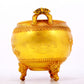 An exquisite gilt bronze elephant-patterned two-eared and tripod censer with lid