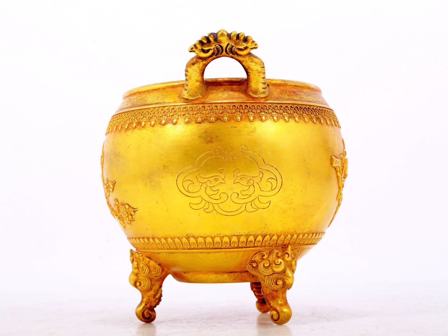 An exquisite gilt bronze elephant-patterned two-eared and tripod censer with lid