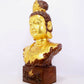 A solemn gilt bronze statue of Guanyin