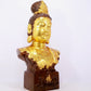 A solemn gilt bronze statue of Guanyin