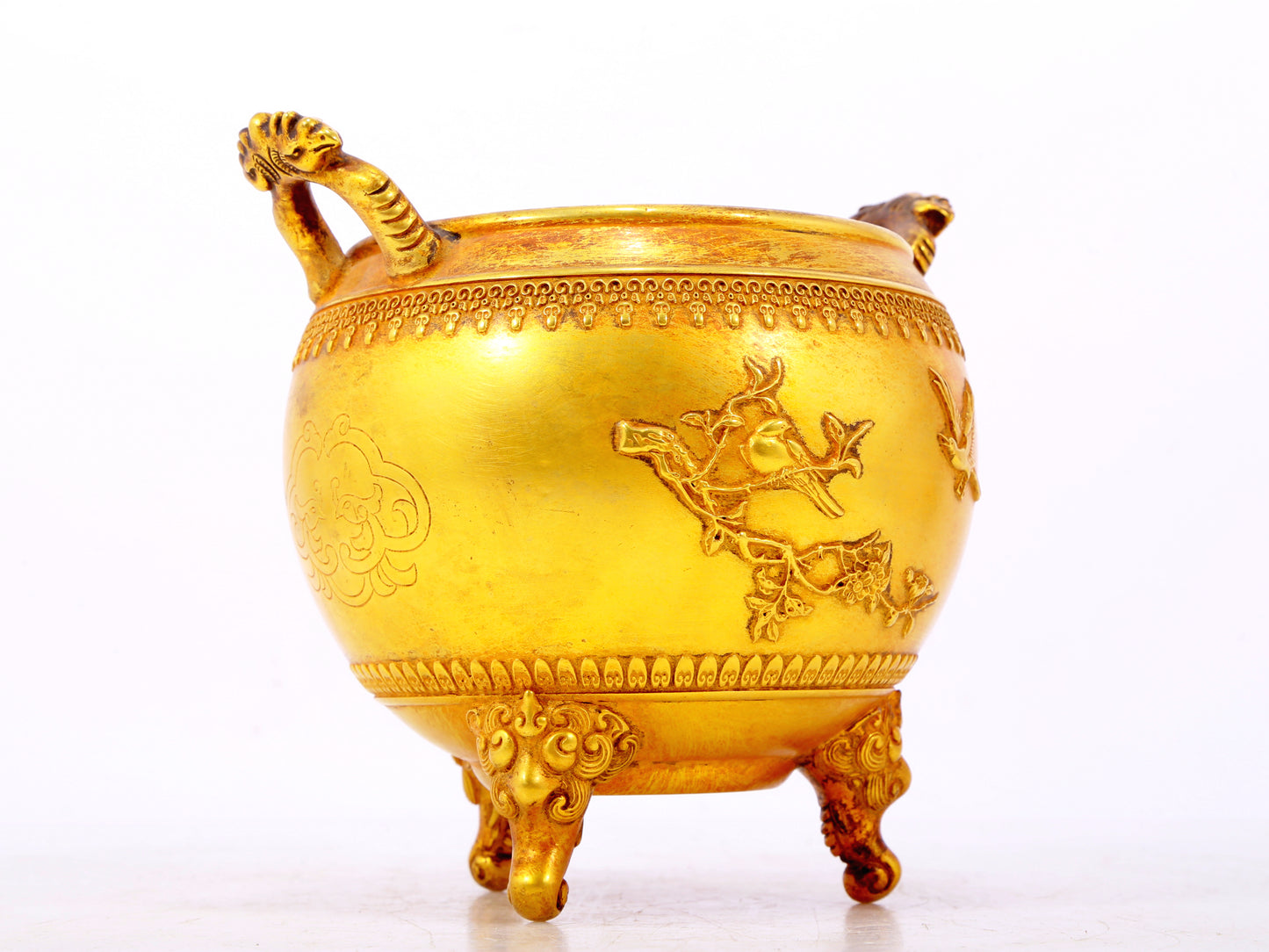 An exquisite gilt bronze elephant-patterned two-eared and tripod censer with lid