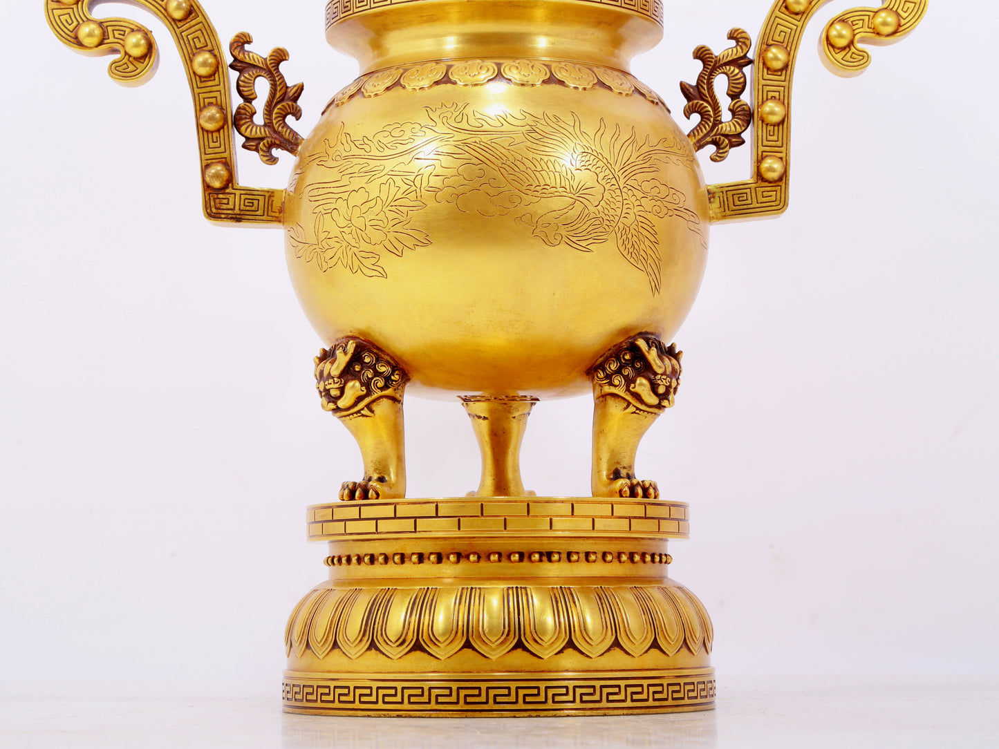 A pair of exquisite gilt bronze phoenix and flower pattern double-eared and three-legged incense burners