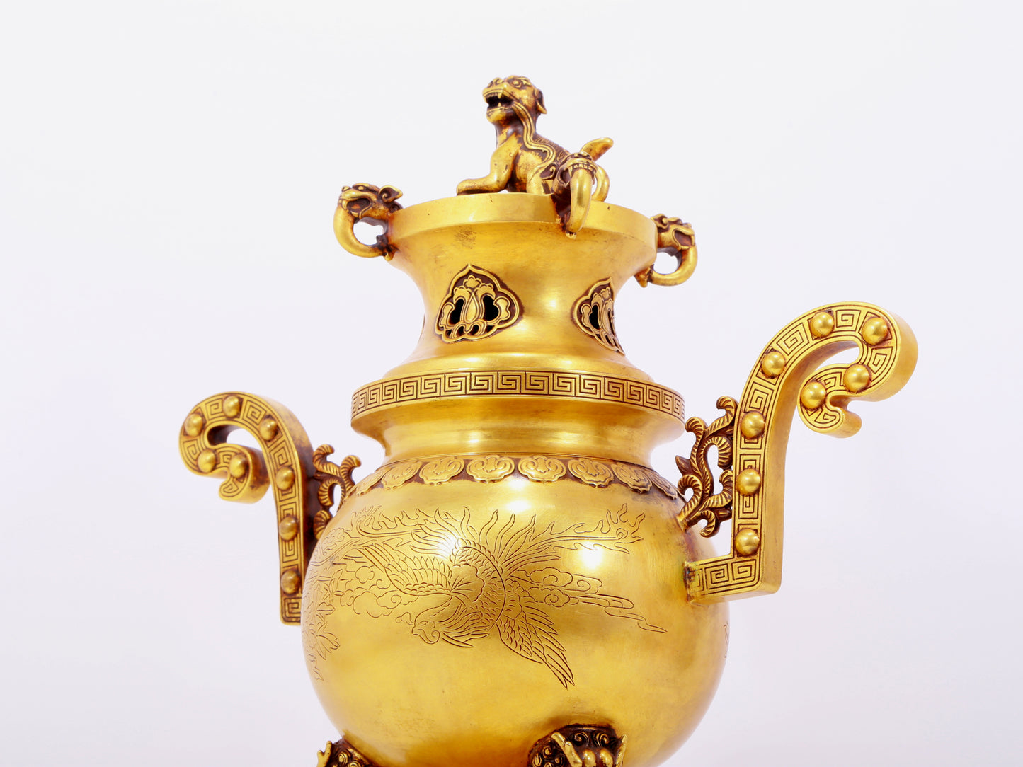 A pair of exquisite gilt bronze phoenix and flower pattern double-eared and three-legged incense burners