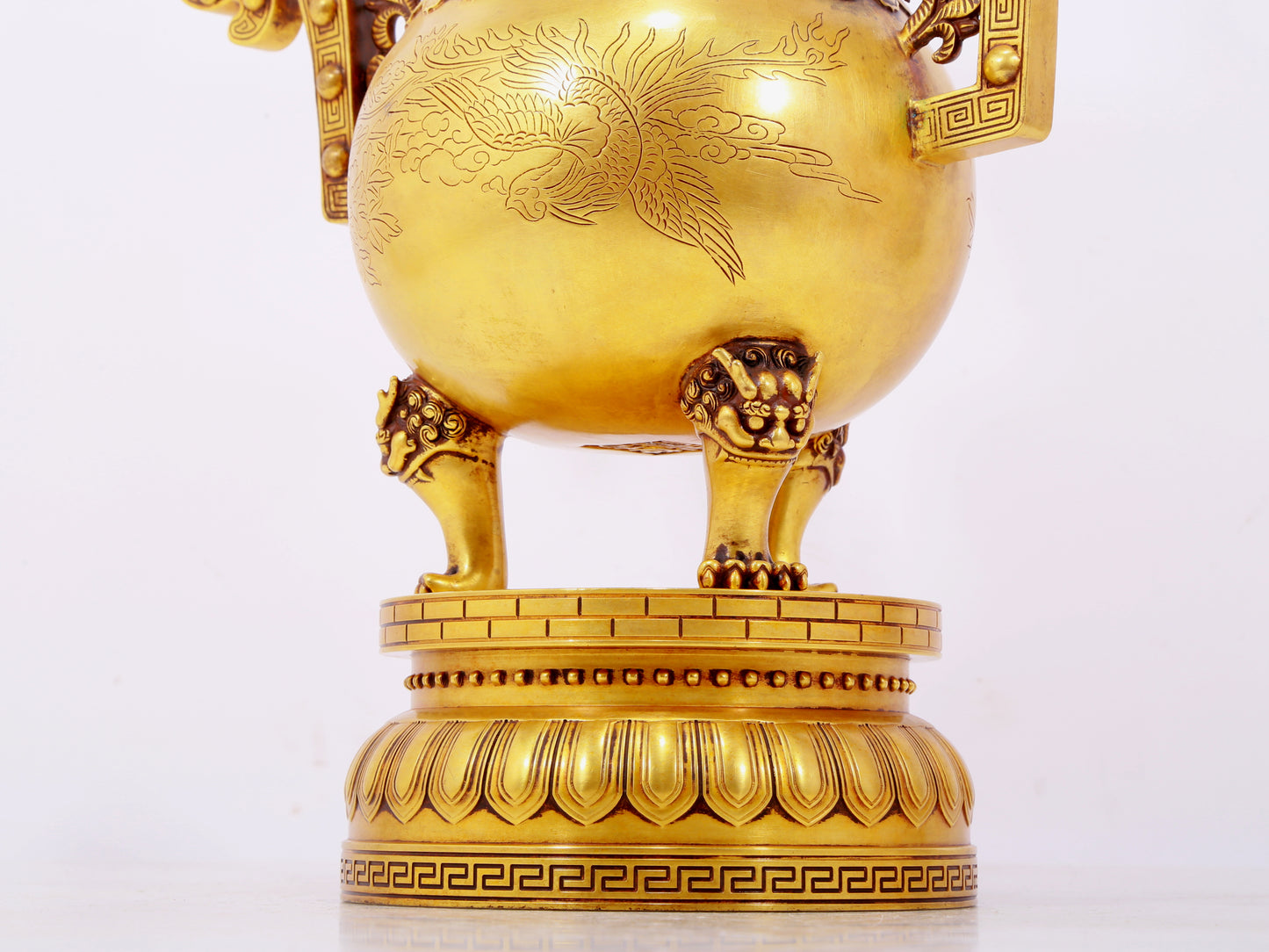 A pair of exquisite gilt bronze phoenix and flower pattern double-eared and three-legged incense burners