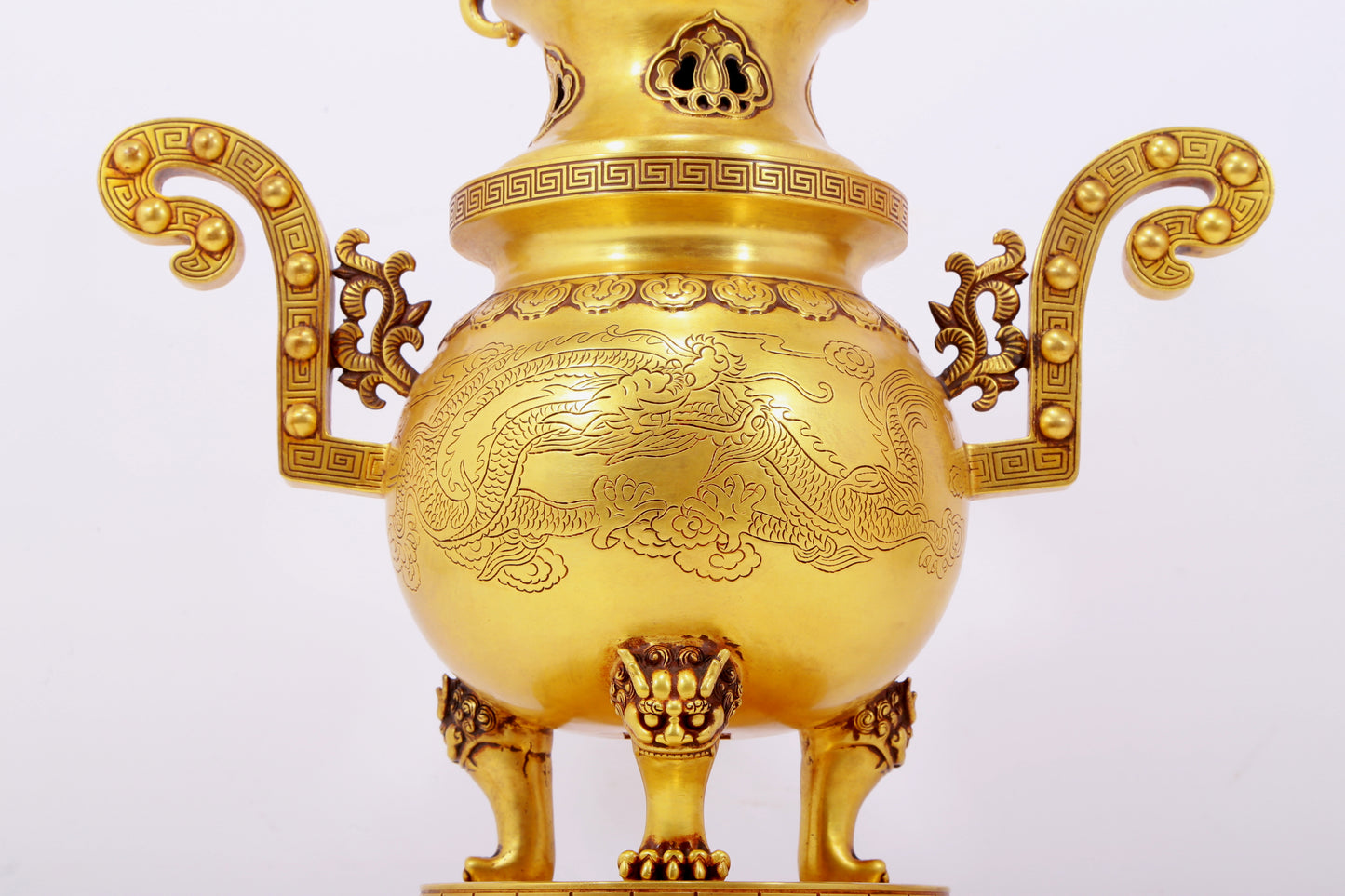 A pair of exquisite gilt bronze phoenix and flower pattern double-eared and three-legged incense burners