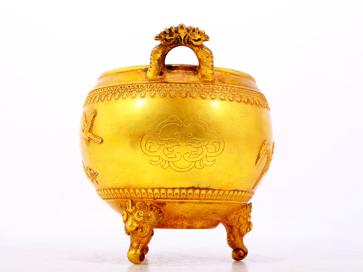 An exquisite gilt bronze elephant-patterned two-eared and tripod censer with lid