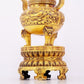 A pair of exquisite gilt copper three-legged incense burners with animal faces and two ears