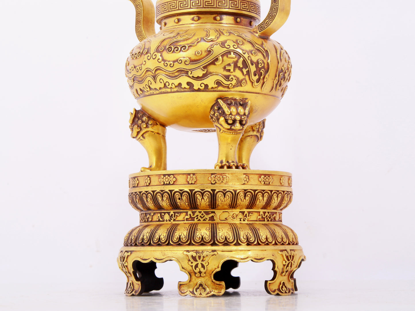 A pair of exquisite gilt copper three-legged incense burners with animal faces and two ears