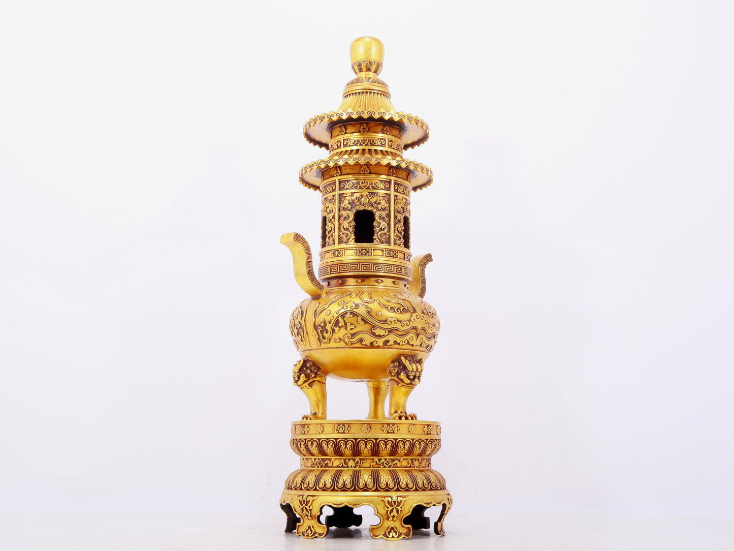 A pair of exquisite gilt copper three-legged incense burners with animal faces and two ears