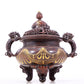 An exquisite gilt bronze elephant-patterned two-eared and tripod censer with lid