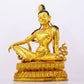 A solemn gilt bronze statue of Guanyin