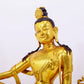 A solemn gilt bronze statue of Guanyin