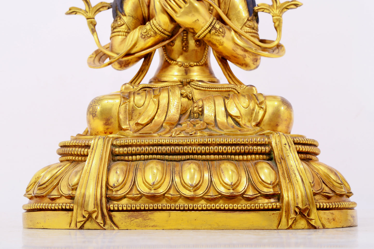 A solemn gilt bronze statue of Bodhisattva