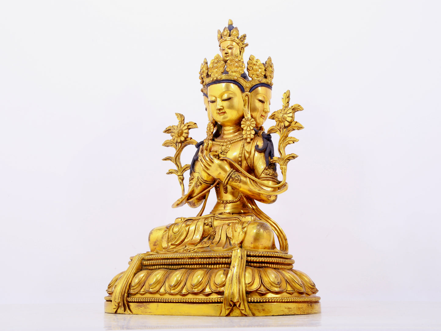 A solemn gilt bronze statue of Bodhisattva