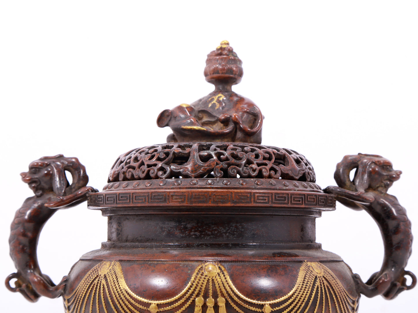 An exquisite gilt bronze elephant-patterned two-eared and tripod censer with lid