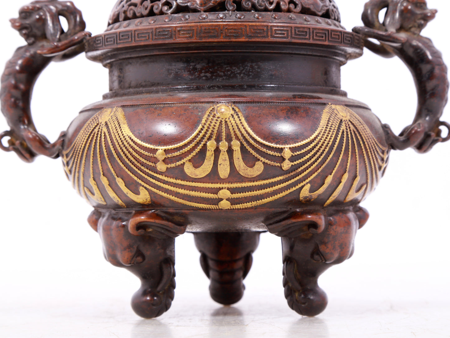 An exquisite gilt bronze elephant-patterned two-eared and tripod censer with lid