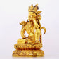 A solemn gilt bronze statue of Guanyin