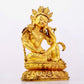 A solemn gilt bronze statue of Guanyin