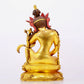 A solemn gilt bronze statue of Guanyin