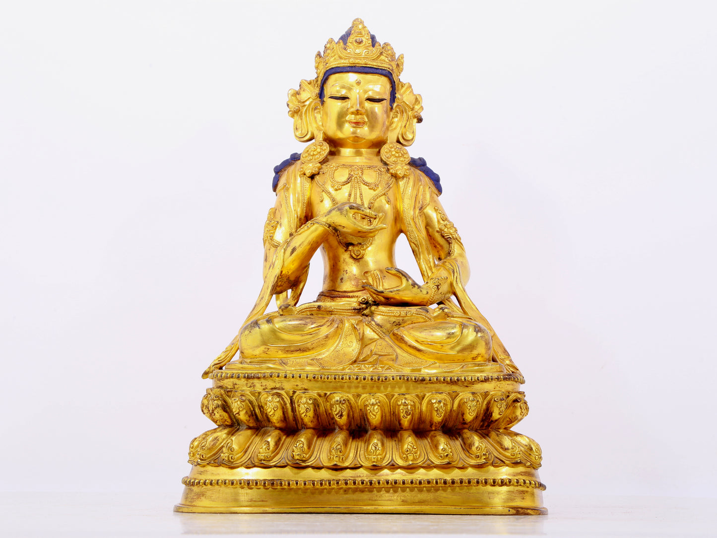 A solemn gilt bronze statue of Bodhisattva