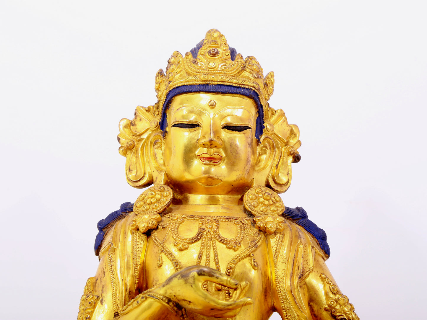 A solemn gilt bronze statue of Bodhisattva