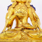 A solemn gilt bronze statue of Bodhisattva