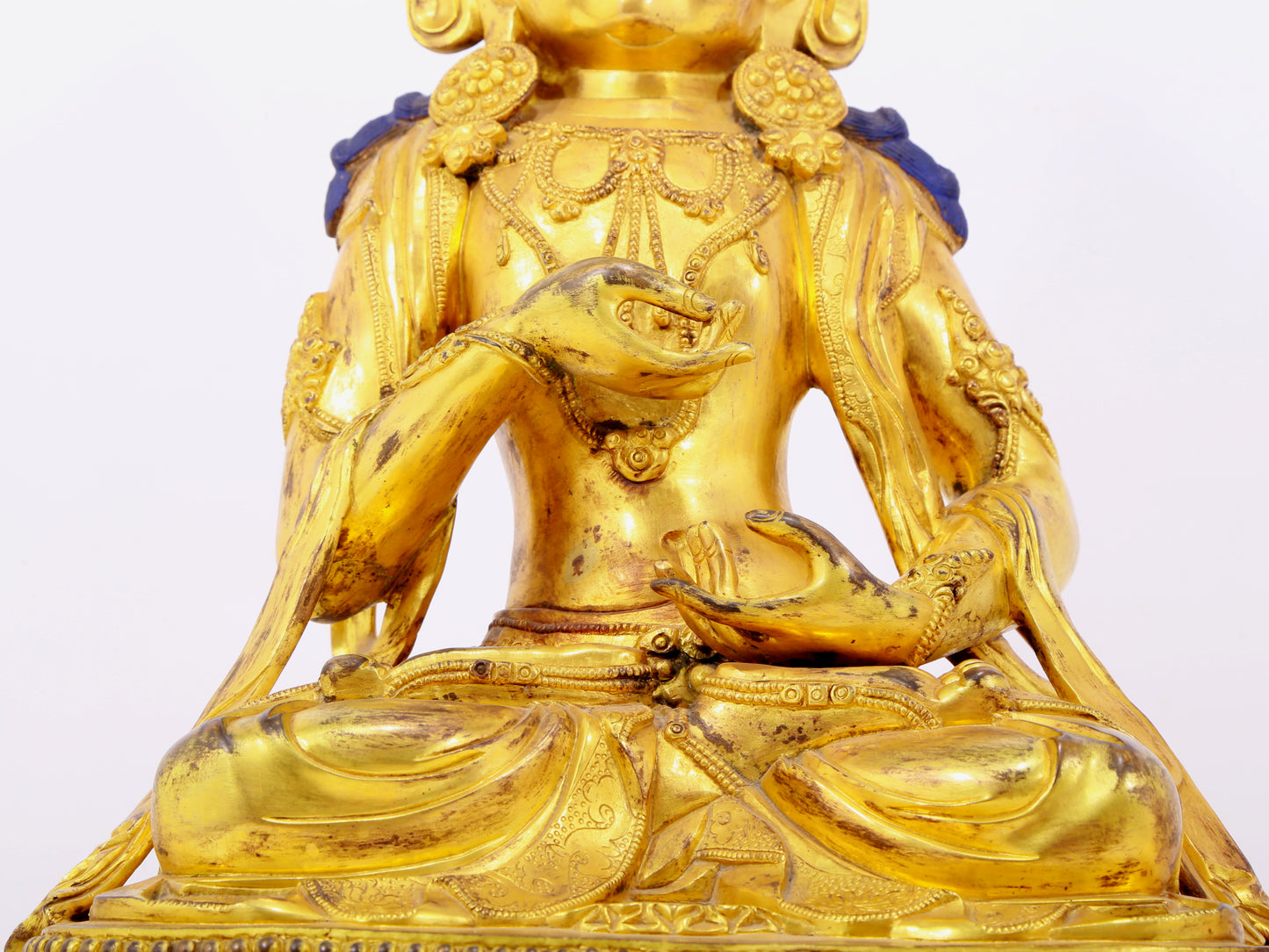 A solemn gilt bronze statue of Bodhisattva