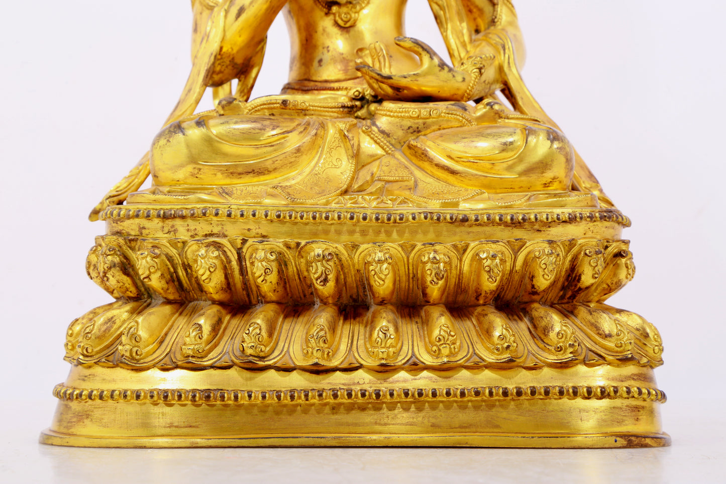 A solemn gilt bronze statue of Bodhisattva