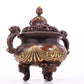 An exquisite gilt bronze elephant-patterned two-eared and tripod censer with lid